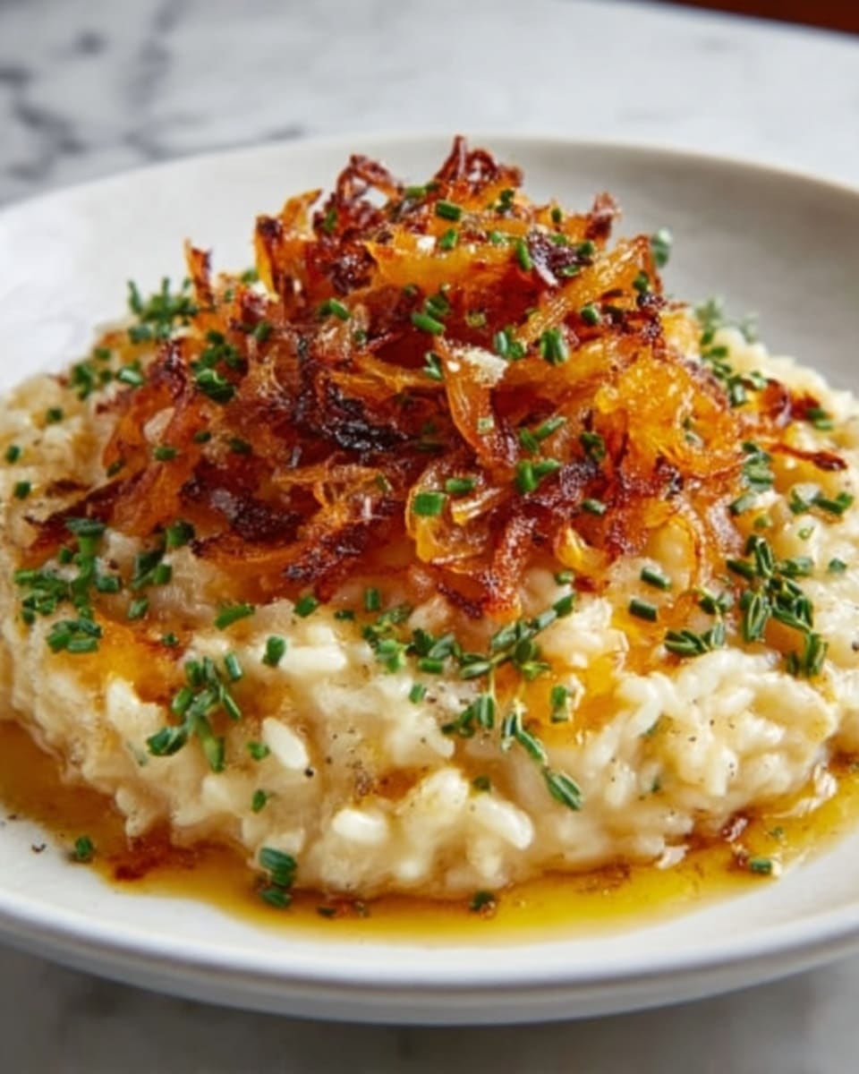 A close-up of a creamy risotto served on a white plate, showing about three layers: the bottom layer is a smooth and creamy beige risotto with visible grains of rice, the middle layer has bright orange roasted pumpkin cubes scattered on top, and the top layer is a mix of golden brown caramelized bacon pieces and green herbs finely chopped, adding texture and color; the entire dish is garnished with a light drizzle of oil or sauce, all placed on a white marbled surface. Photo taken with an iphone --ar 4:5 --v 7