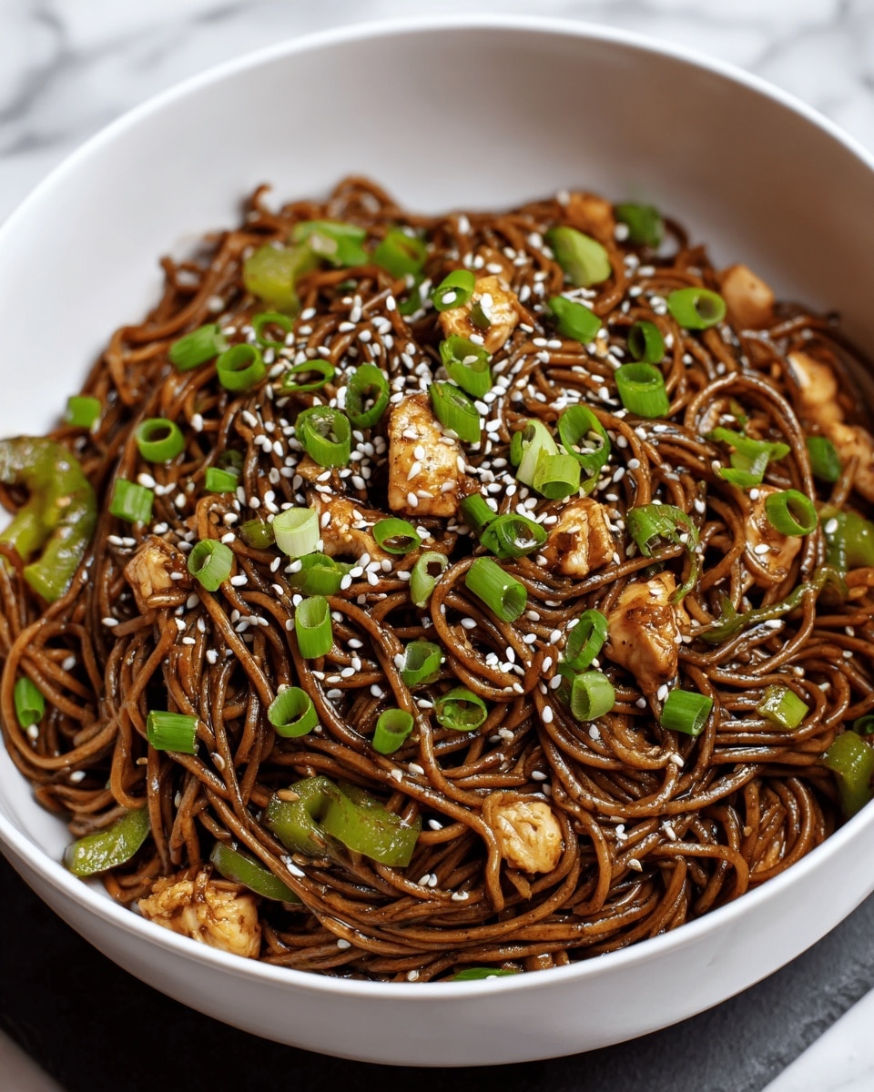 A white bowl filled with a stack of dark brown noodles mixed with small pieces of light brown chicken and green bell pepper chunks. The noodles have a shiny, saucy texture and are twisted in layers, while the chicken and peppers are scattered evenly throughout. The top is sprinkled with chopped green onions and white sesame seeds, adding bright green and white colors over the dark noodles. The bowl is placed on a white marbled surface. photo taken with an iphone --ar 4:5 --v 7